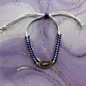 Handmade purple Virgin Mary adjustable bracelet